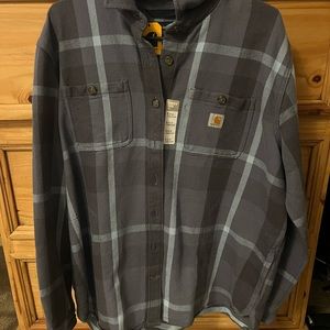 Women’s Carhart long top with side pockets.